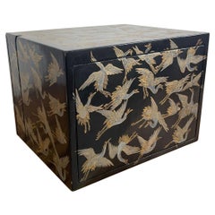 Used Japanese Storage Box With Hidden Compartments and Crane Motif.