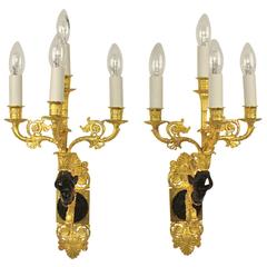 Pair of Charles X Gilt-Bronze and Patinated Four-Branch Wall Lights