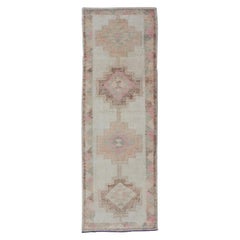 Vintage Turkish Tulu Runner with Soft Pastel and Beige Geometric Patterns