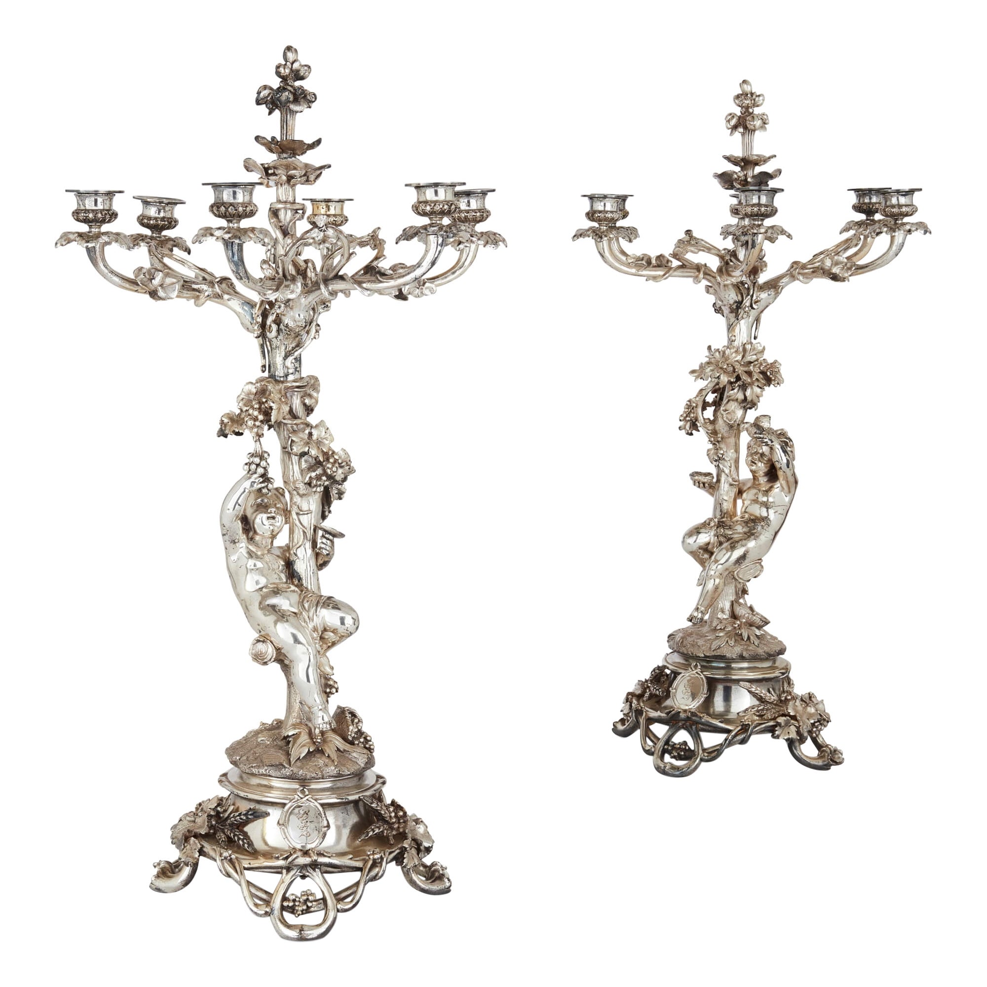 Pareja de candelabros antiguos de seis luces de bronce plateado de Christofle