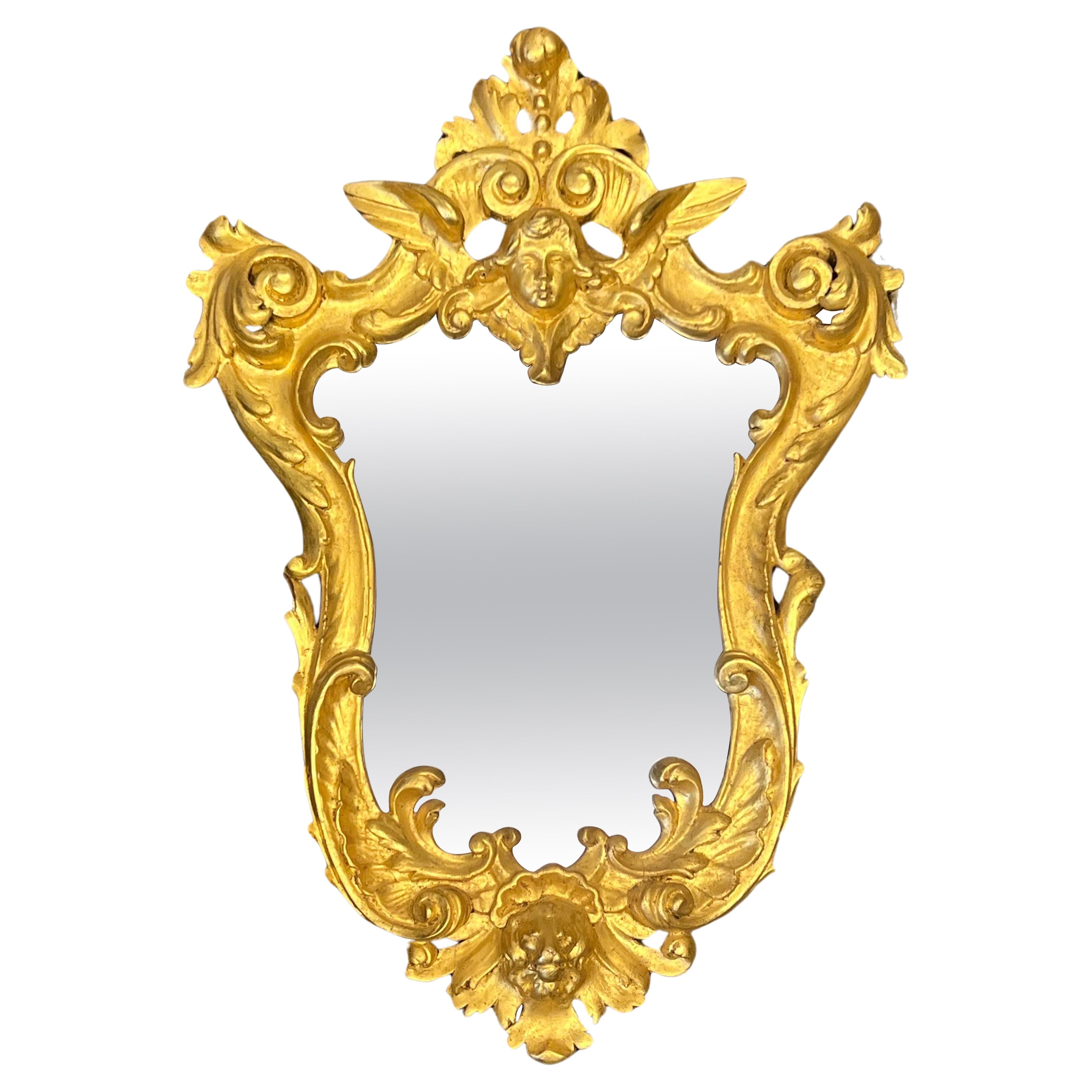 Miroir mural français du 19ème siècle en bois doré sculpté à la main de style Louis XV en vente