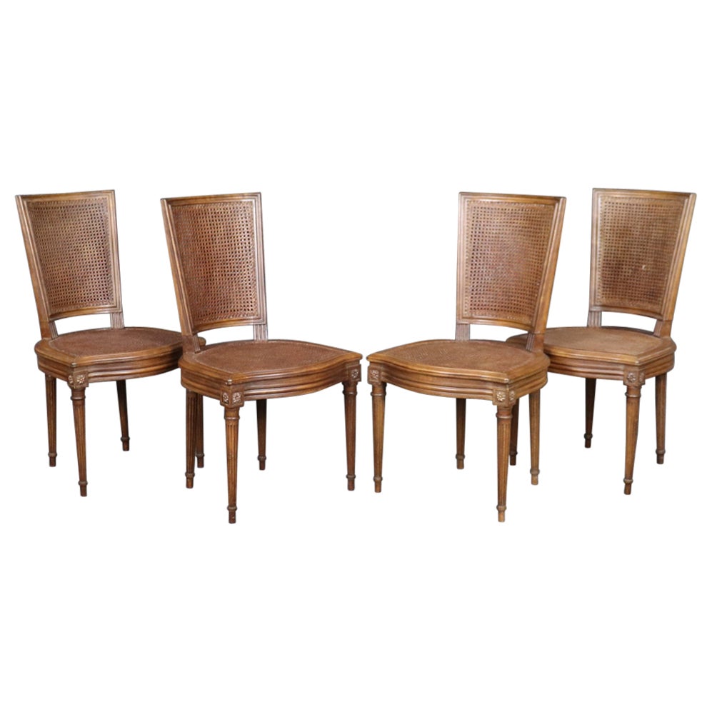 Satz von 4 französischen Esszimmerstühlen aus Schilfrohr im Louis-XVI.-Stil, um 1940