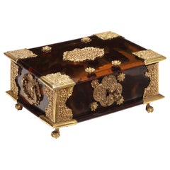 A small Dutch colonial Indonesian tortoiseshell betel box with gold mounts