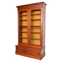 Used Victorian Carved Walnut Glass Front Bookcase Cabinet, Circa 1880s
