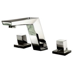 Grifería de lavabo de tres orificios para montaje en cubierta Dornbracht Supernova, 2009, Italia.