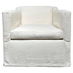 slip cover swivel chair upholstered in white belgian linen