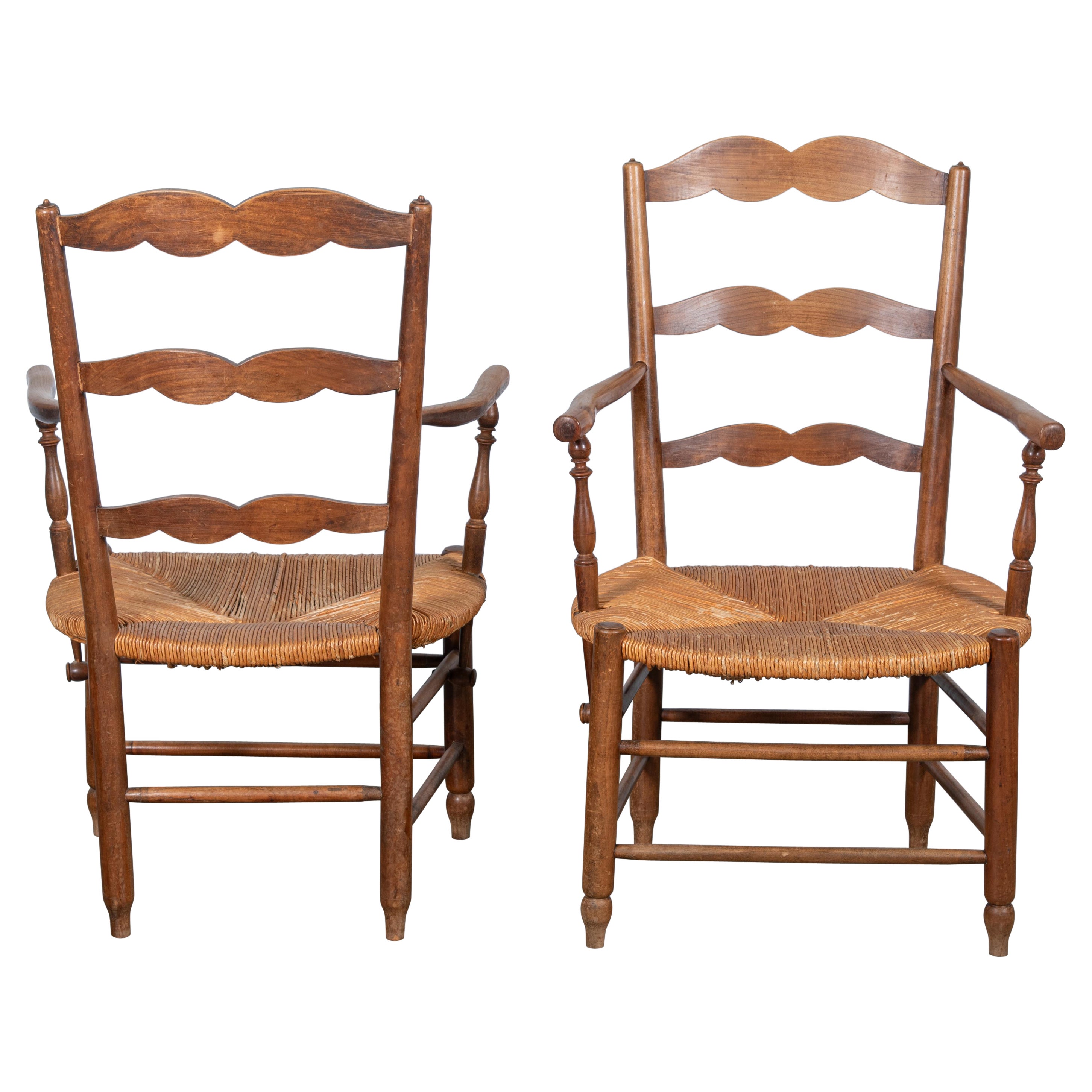 Set of Two 19th Century French Country Style Rattan Arm Chairs For Sale