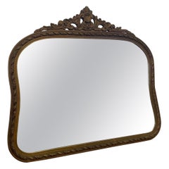 Vintage Arched Ornate Carved Gilt Wood Framed Mirror. Circa 1940s