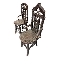 Pair of Antique Black Forest Armchairs