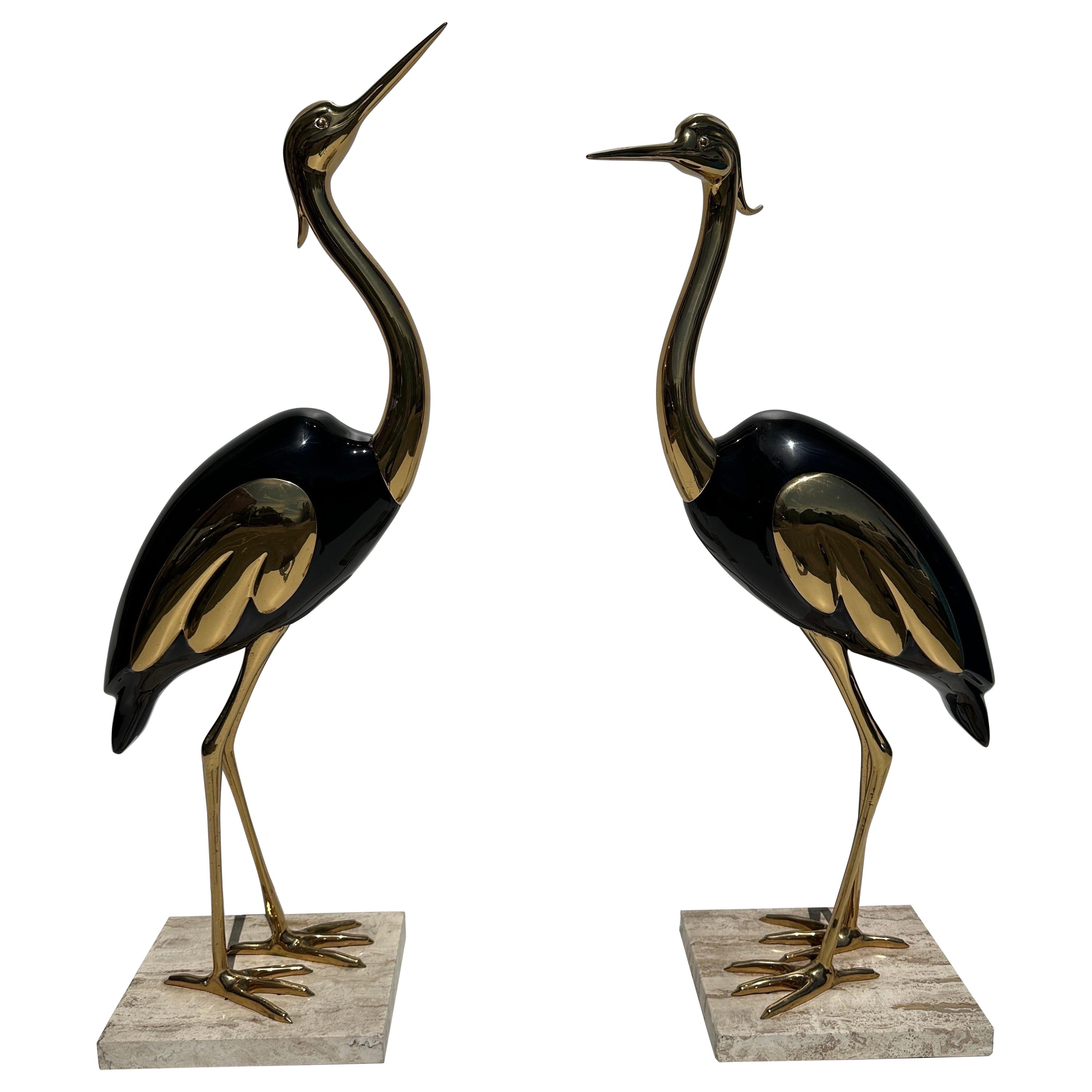 Pareja de esculturas de garzas de latón