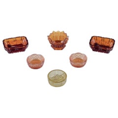 Vintage Fåglavik Glasbruk, Sweden. Six  salt cellars in amber-coloured glass.