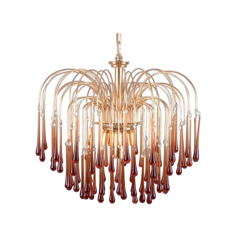 Murano, Italy. Large ceiling lamp in amber art glass, with brass frame. For Sale