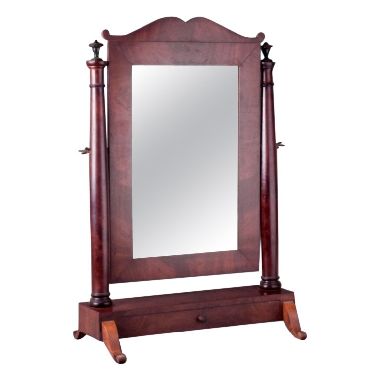 Mahogany tilting mirror with pull-out drawer, Denmark. Approximately 1900.