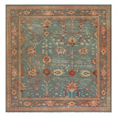 Türkischer Oushak-Teppich aus der Jahrhundertmitte, handgefertigt aus Wolle