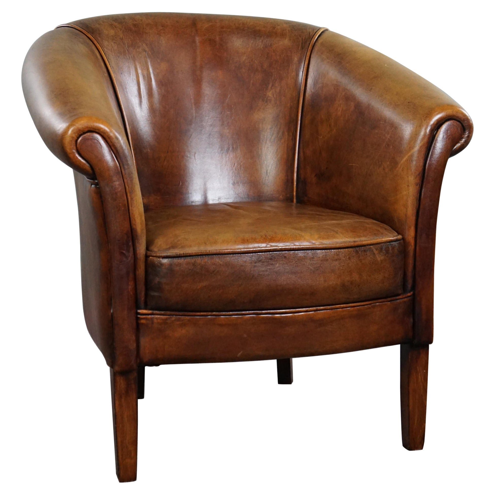 Elegant sheepskin club armchair in good condition
