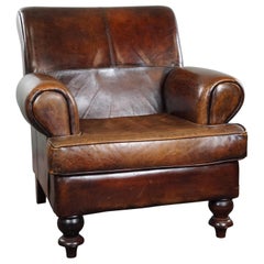 Used Spacious sheepskin armchair with a relaxed deep seat