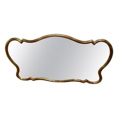 A Superb Very Large Italian Gilt Scallop Shaped Mirror