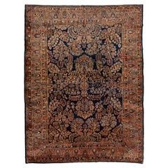 Ancien tapis persan Sarouk Farahan en laine à motifs floraux fait à la main en bleu marine