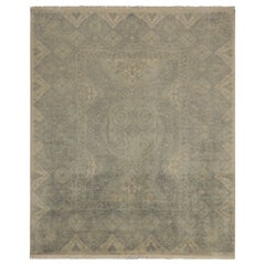 Rug & Kilim's Classic Persian style rug with Blue and Ivory Floral Pattern (tapis de style persan classique avec motif floral bleu et ivoire)