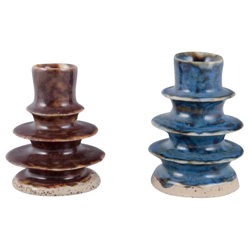 European studio ceramicist. Two unique ceramic candleholders. 1980s