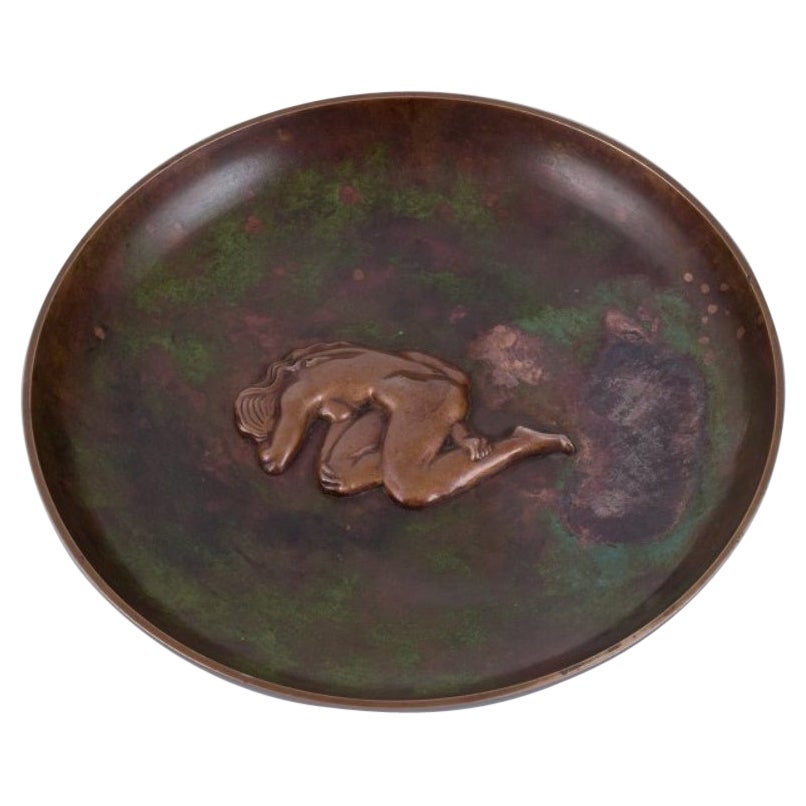 Tinos, Denmark. Large Art Deco bronze bowl with a nude woman. Mid-20th C.