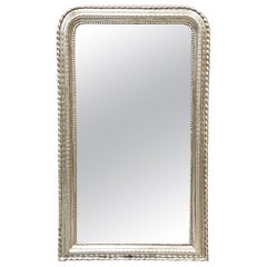 Fin du 19ème siècle, miroir Louis Philippe en argent doré.