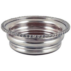 Danish bottle coaster in plated silver and wood. High-quality and heavy.