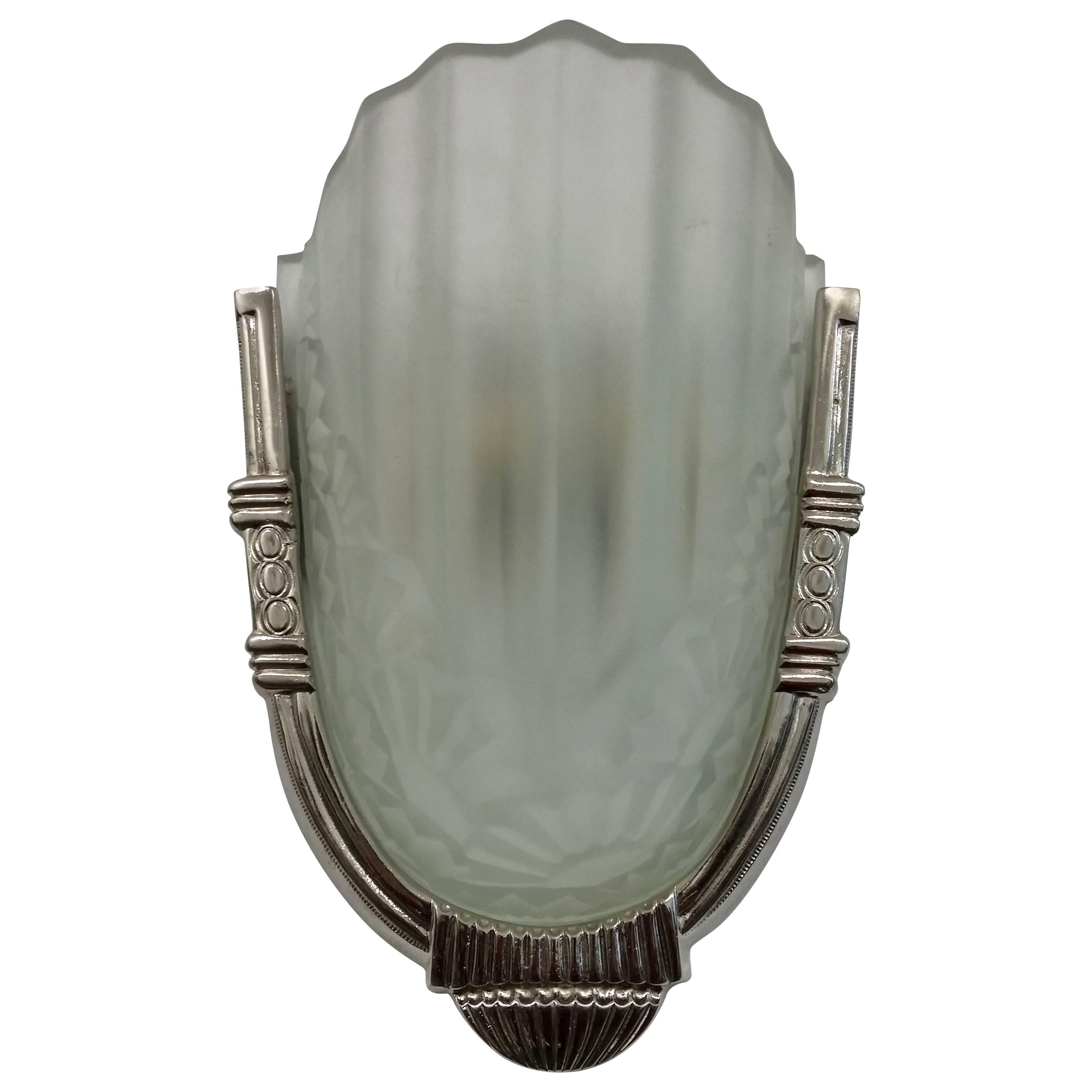 
A pair of French Art Deco wall sconces by the French artist 