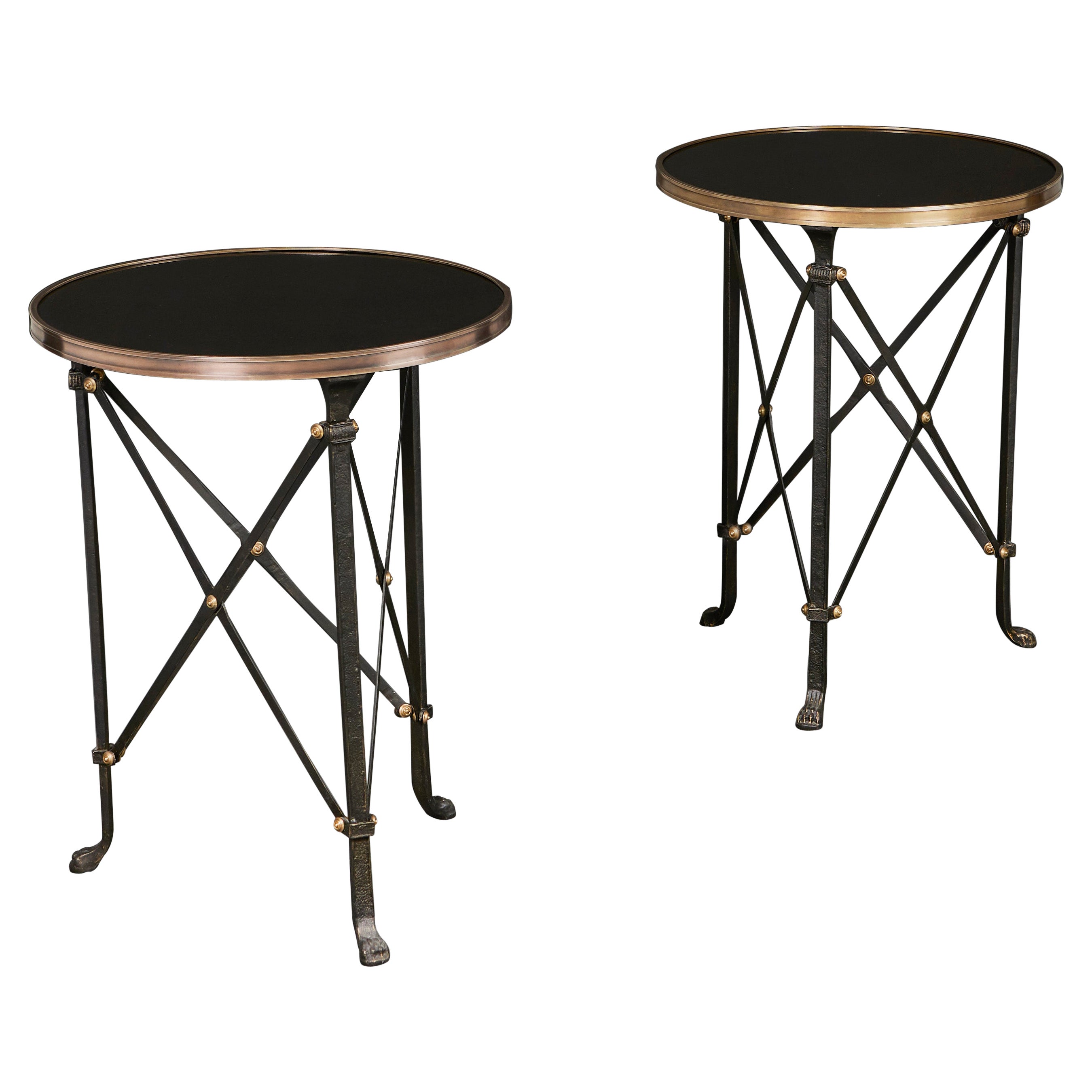 A Pair of Empire Style French Bronze Gueridons with Black Marble Tops For Sale