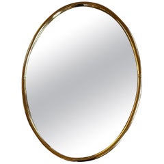 Small oval gilt metal mirror