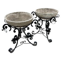 Pair of Spanish Art Dec Cast Stone Planters And Wrought Iron Stands