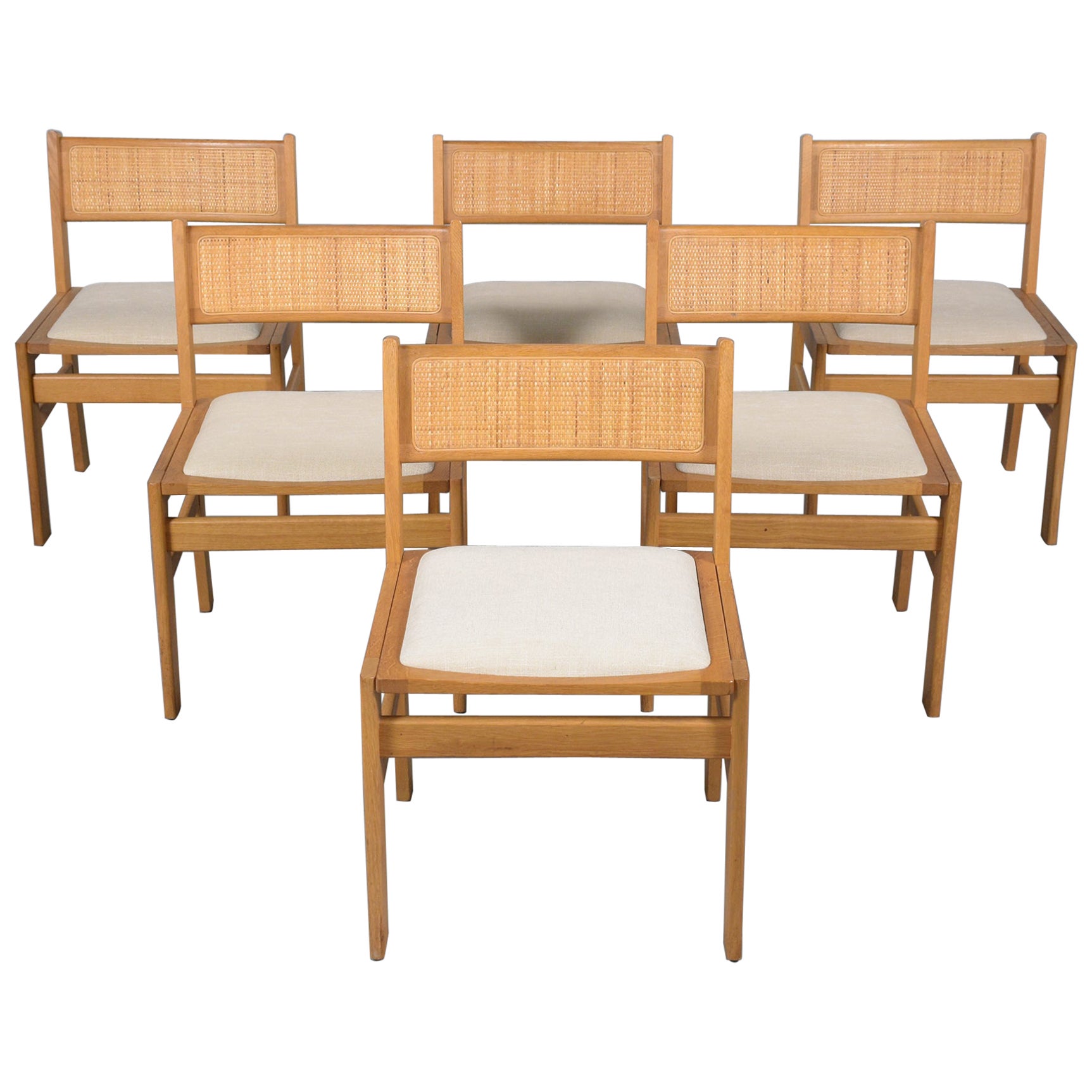 Ensemble de six chaises de salle à manger danoises en teck de style Kurt Ostervig avec dossiers en rotin en vente