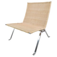 Chaise longue modèle PK22 de Poul Kjærholm fabriquée par Fritz Hansen dans les années 1993