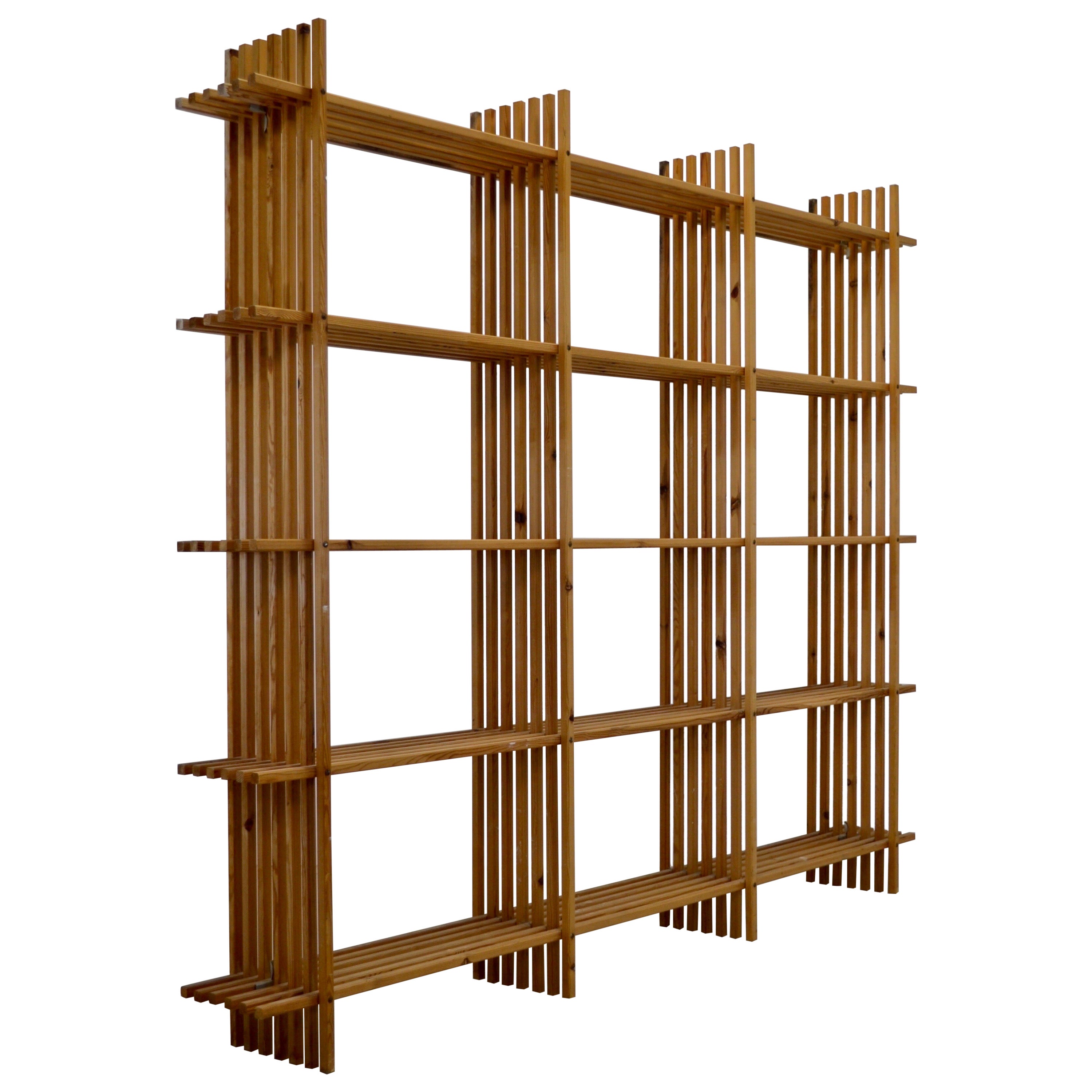 A larch wood geometric bookcase - France 1960. For Sale