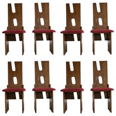 Ensemble de 8 chaises de salle à manger à haut dossier et à découpe des années 1970