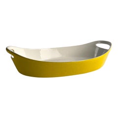 Retro yellow enameled castiron casserole dish by Michael Lax for Copco