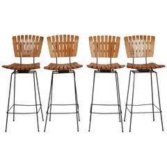 Vintage Set of Four Arthur Umanoff Iron and Slat Wood Swivel Bar Height Stools