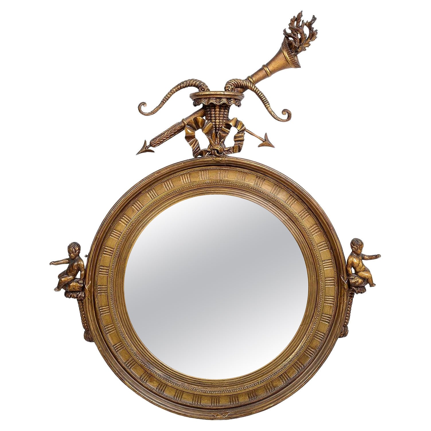 Miroir convexe en bois doré d'époque Régence. en vente