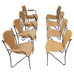 set of 8 wicker and iron dining chairs