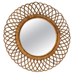 Retro Italian Round mirror with woven wicker (india cane) frame.