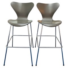 Pair of 2005 Danish Arne Jacobsen Ser. 7 Curved Ash & Steel Dark Grey Bar Stool