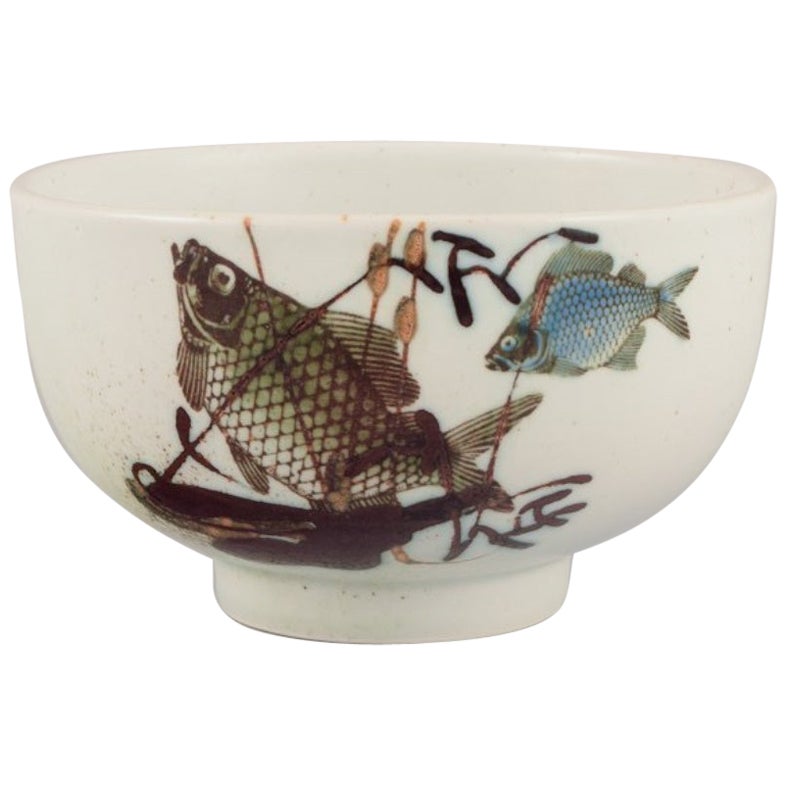 Nils Thorsson for Royal Copenhagen. Faience bowl with fish motifs.  For Sale
