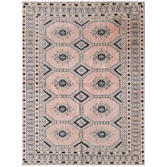 Tapis Bokhara vintage noué à la main dans un ton rose poudré très rare, Pakistan années 1950