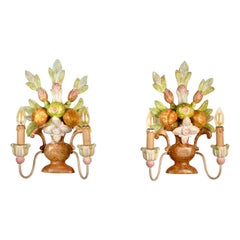 Pair of orange polychrome carved wood sconces from Italy, 1920s