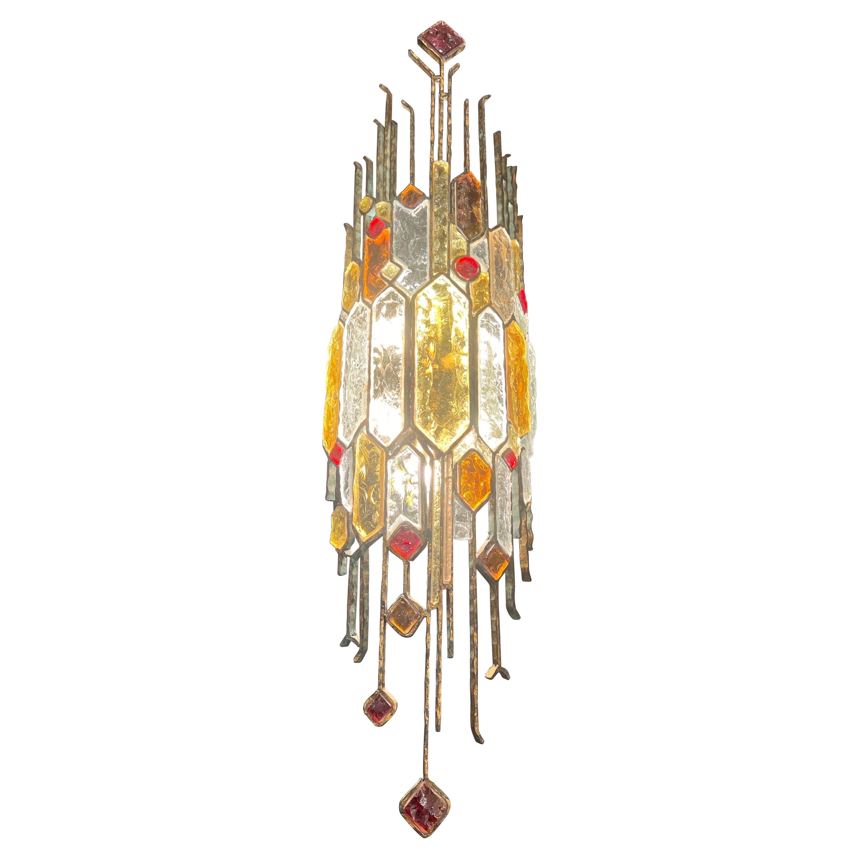A rare extra large sculptural wall light by Albano Poli  For Sale