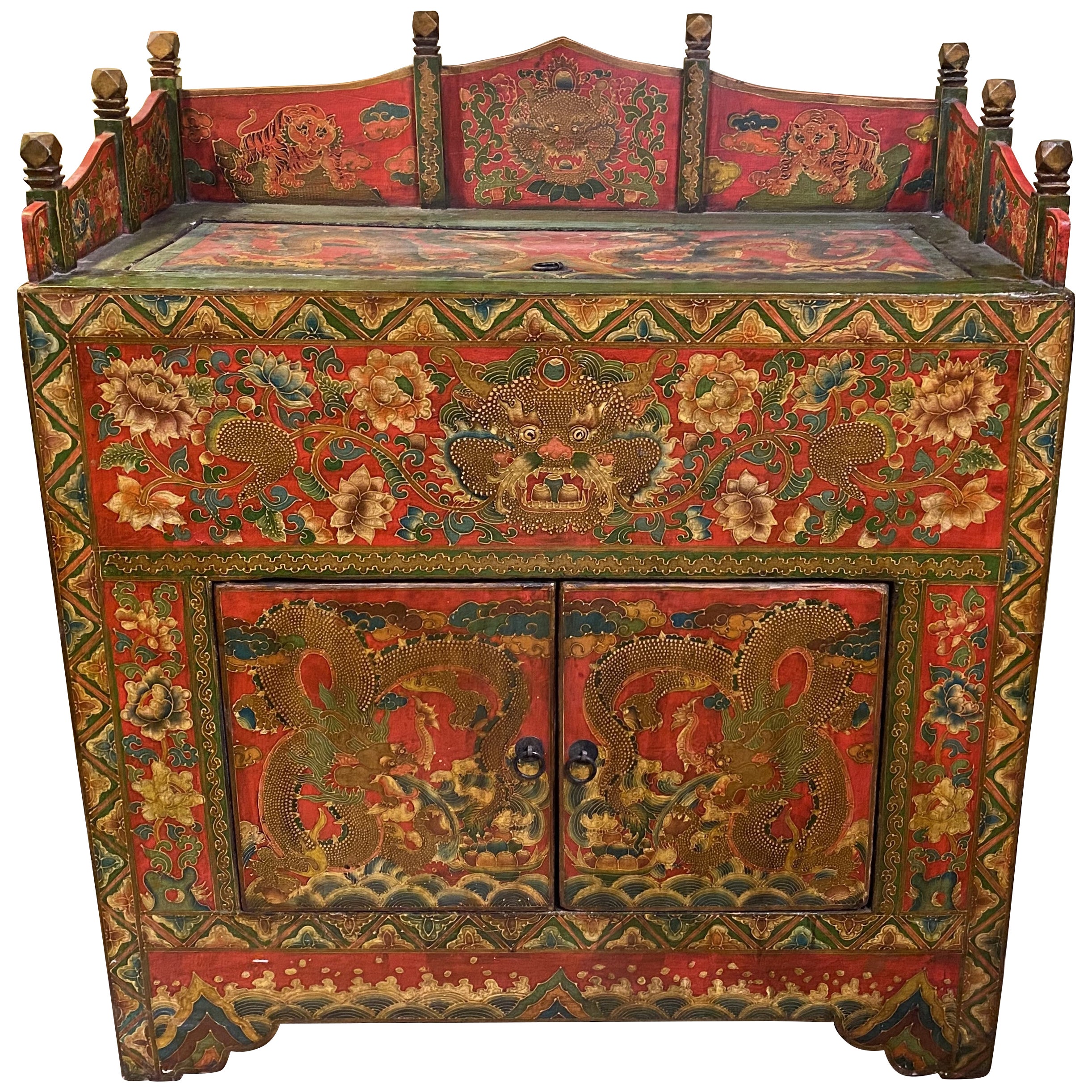 Chinese Paint Decorated Two Door Cabinet with Carved Gallery and Top Lid