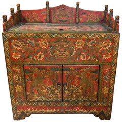 Antique Chinese Paint Decorated Two Door Cabinet with Carved Gallery and Top Lid