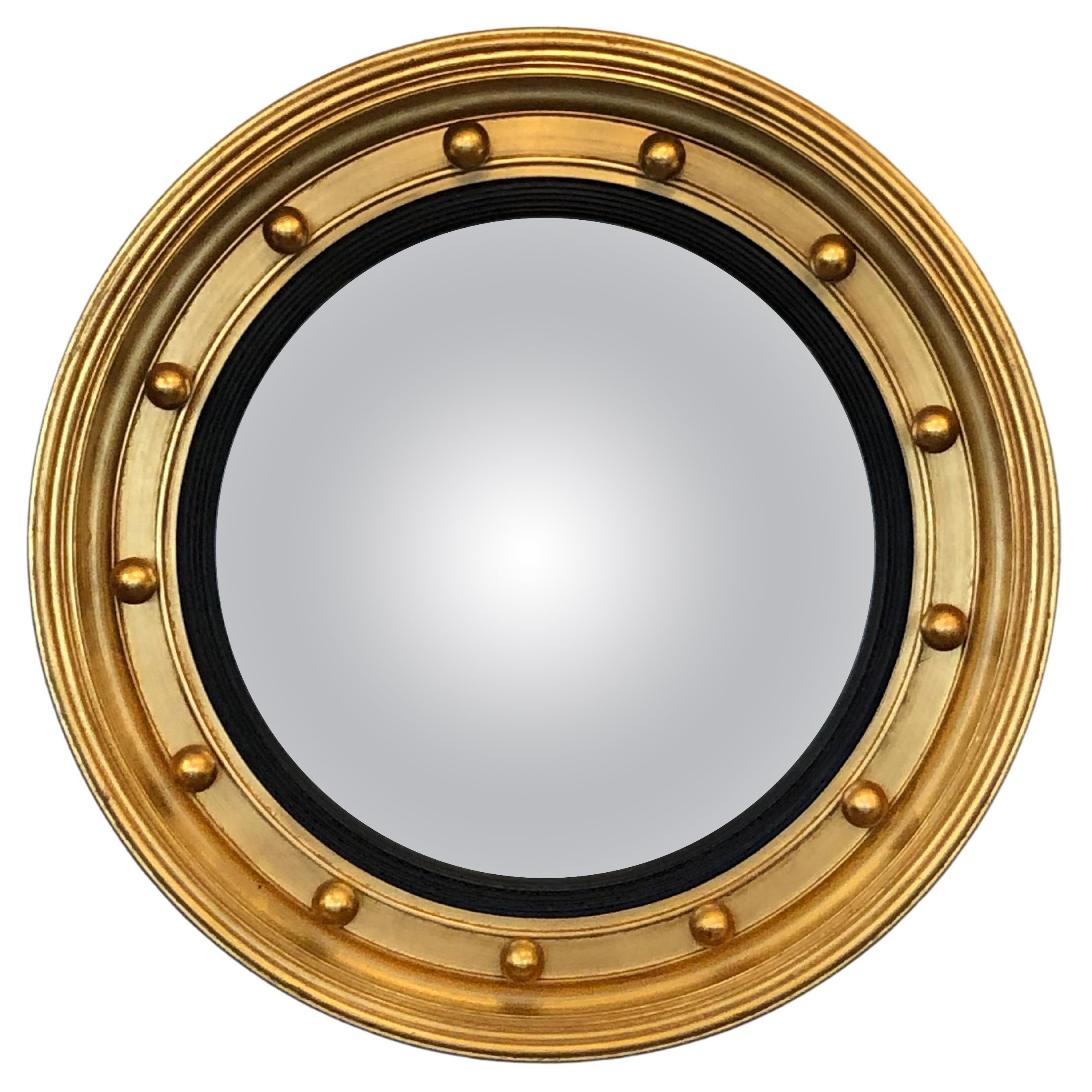 What is an example of a convex mirror?