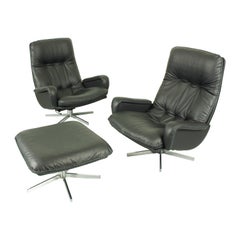 Vintage DS231 James Bond highback swivel chairs and matching ottoman by de Sede Switzerl