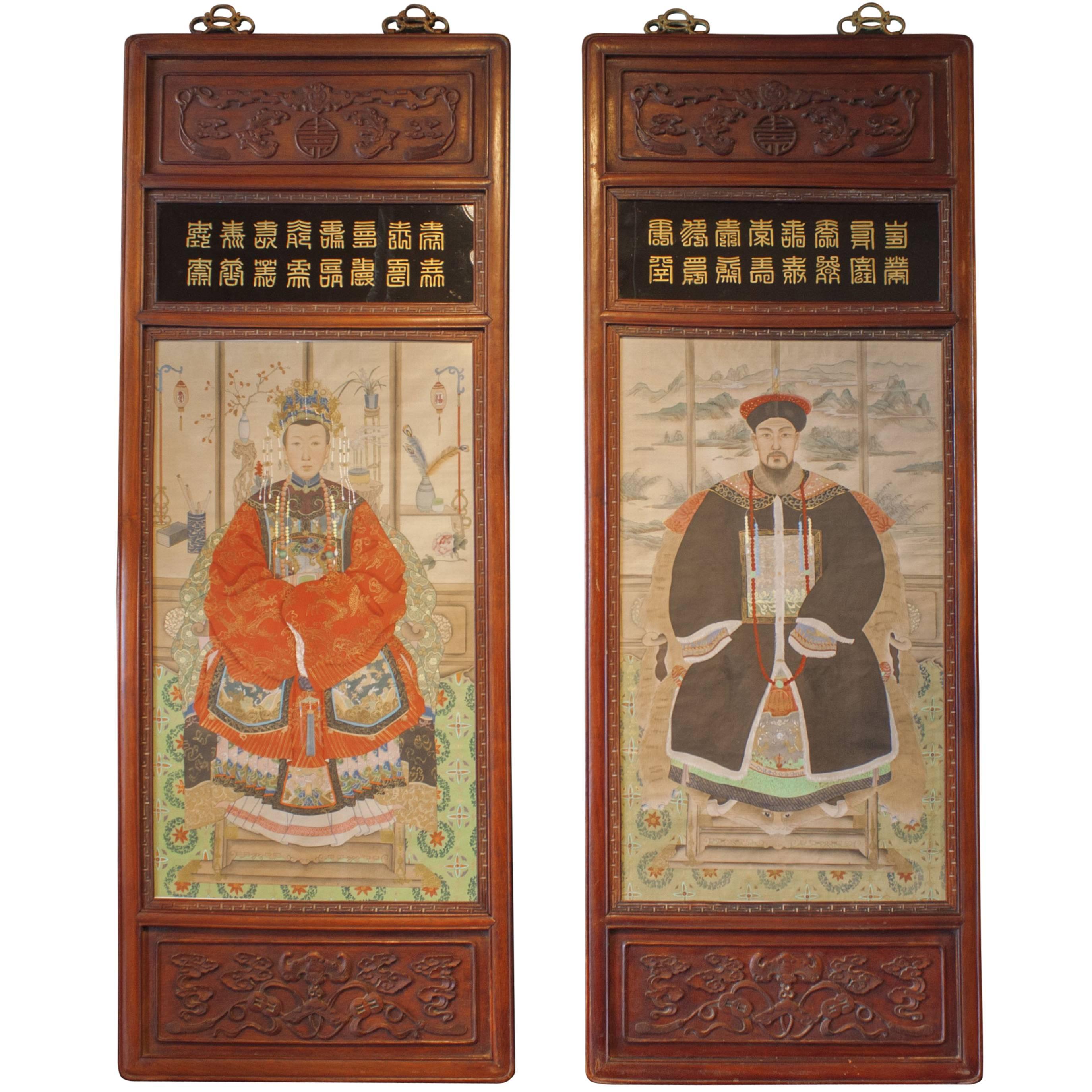 Pair of Chinese Ancestor Portraits in Carved Rosewood Frames